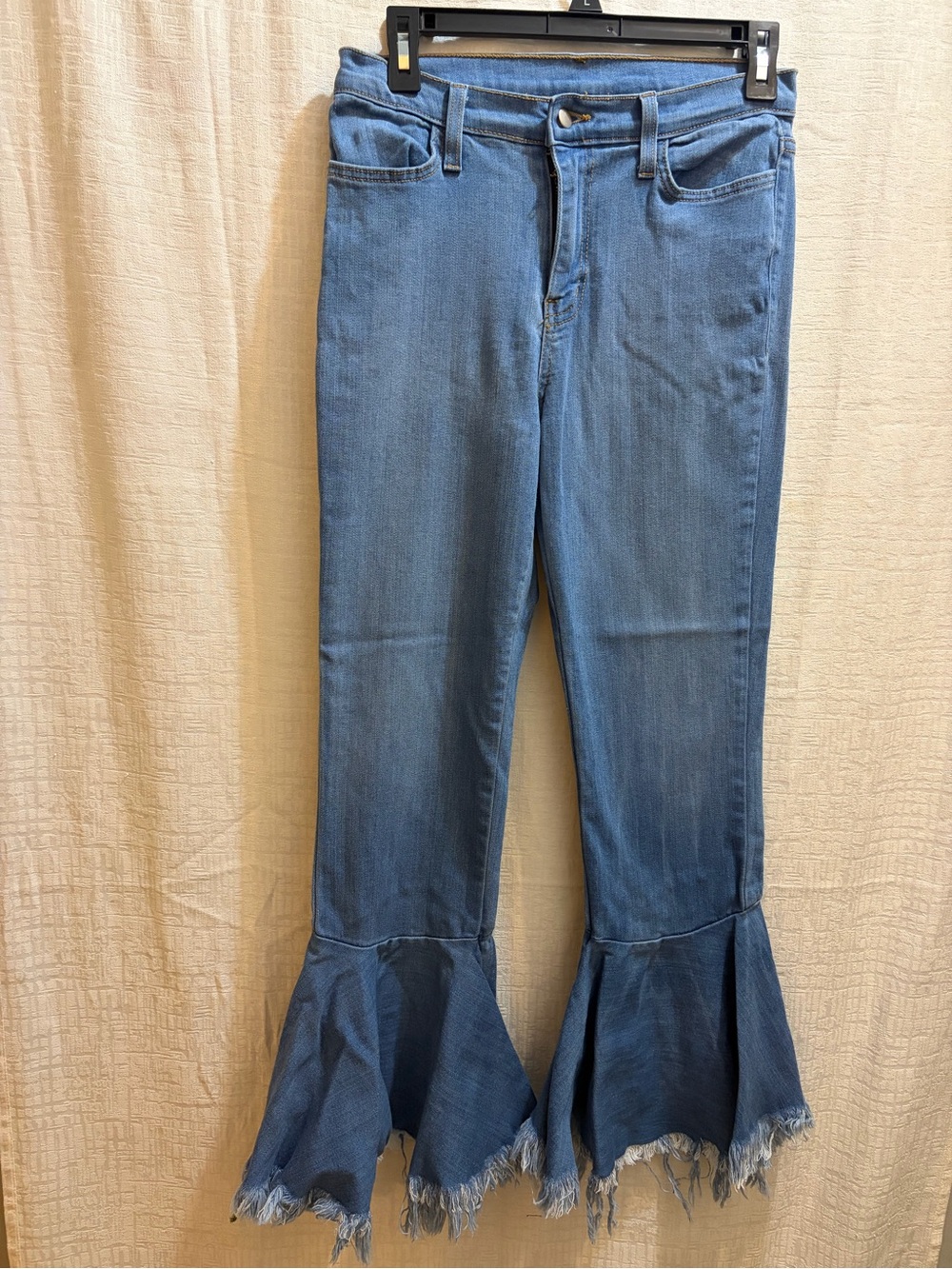 Vibrant Blue Flared Crop Jeans with Frayed Bell Hems